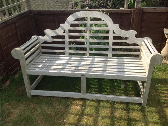 A Lutyens design teak bench